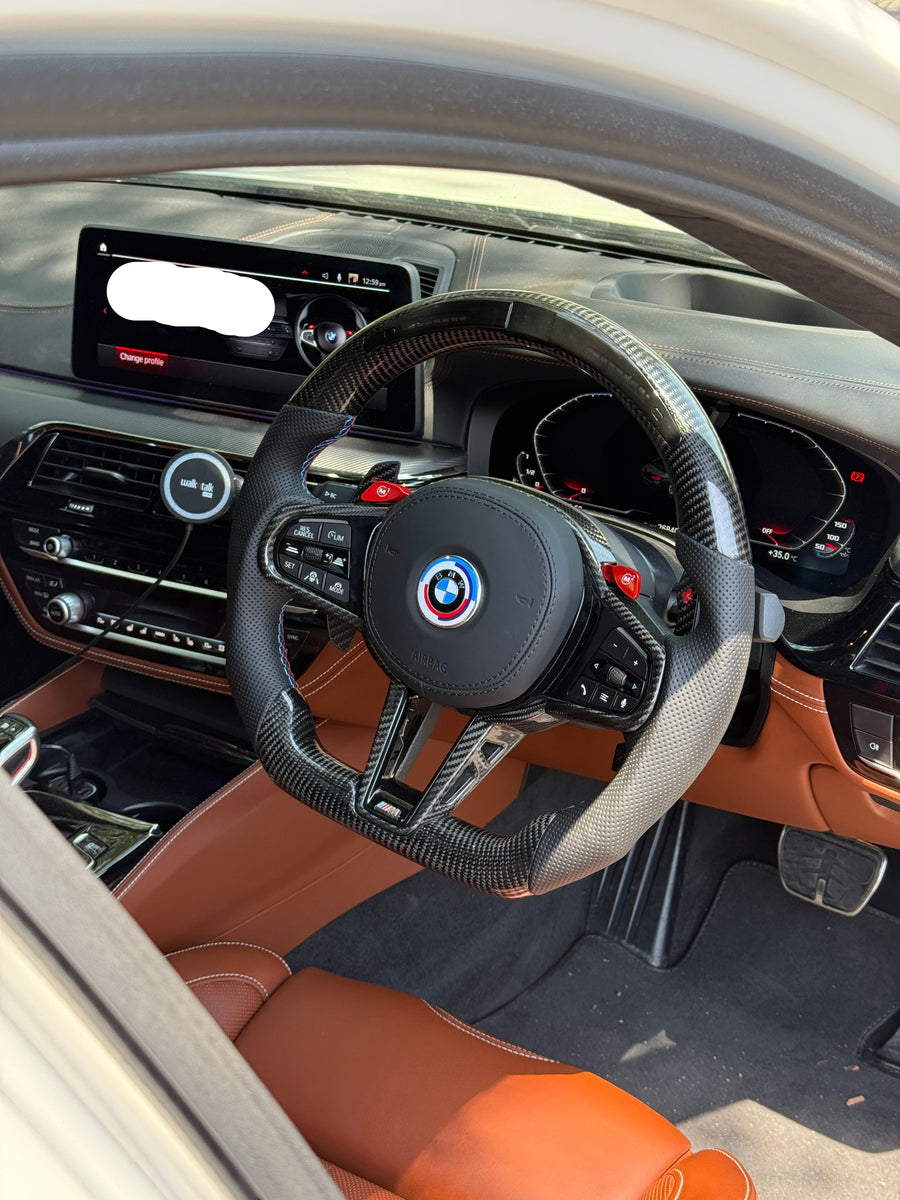 Steering wheel fitted to a 2021 BMW M5 Competition