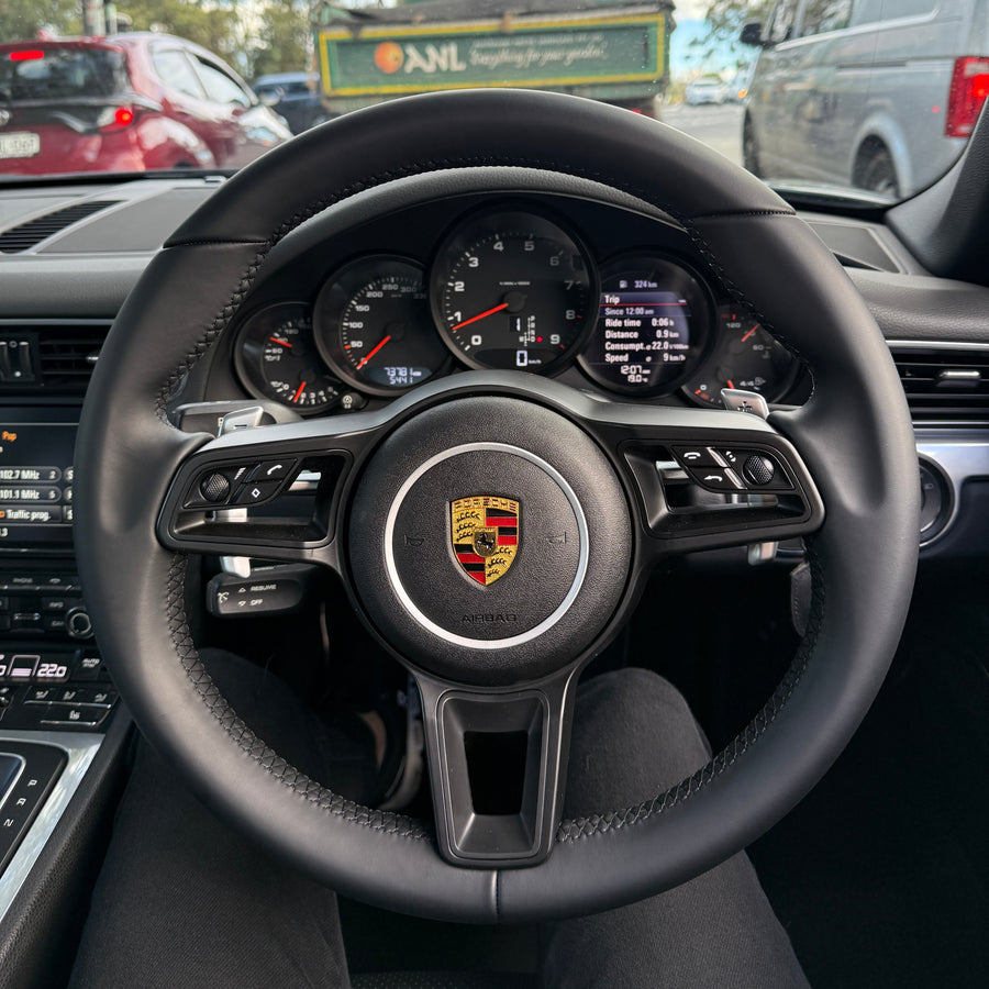 Steering wheel fitted to a 2016 Porsche 911 Carrera